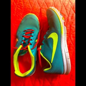 Nike Free. Orange/white polka dot strings. Great used condition.